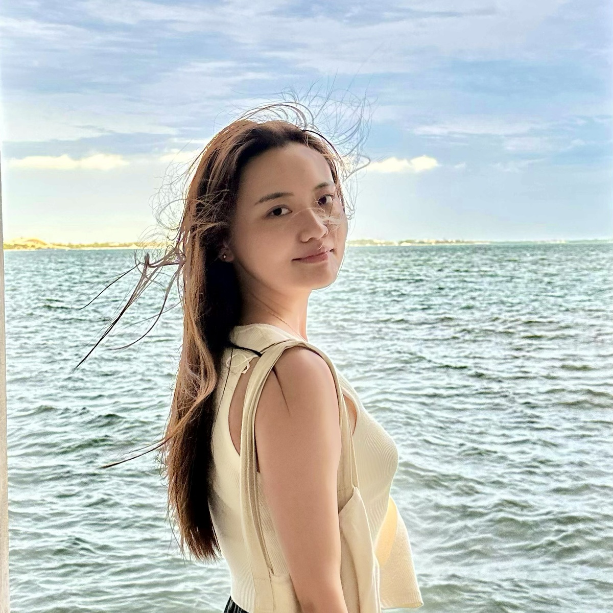 55 portrait by the water